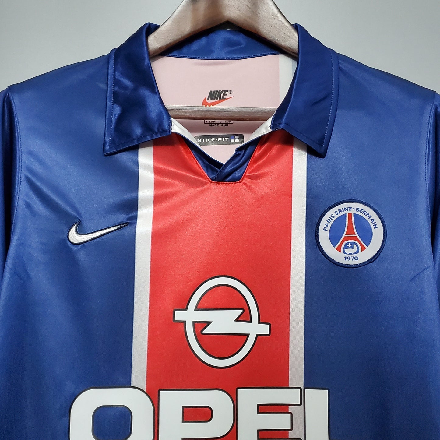 Camiseta clásica PSG Nike azul y roja con logo Opel, venta en Reino del Futbol online.