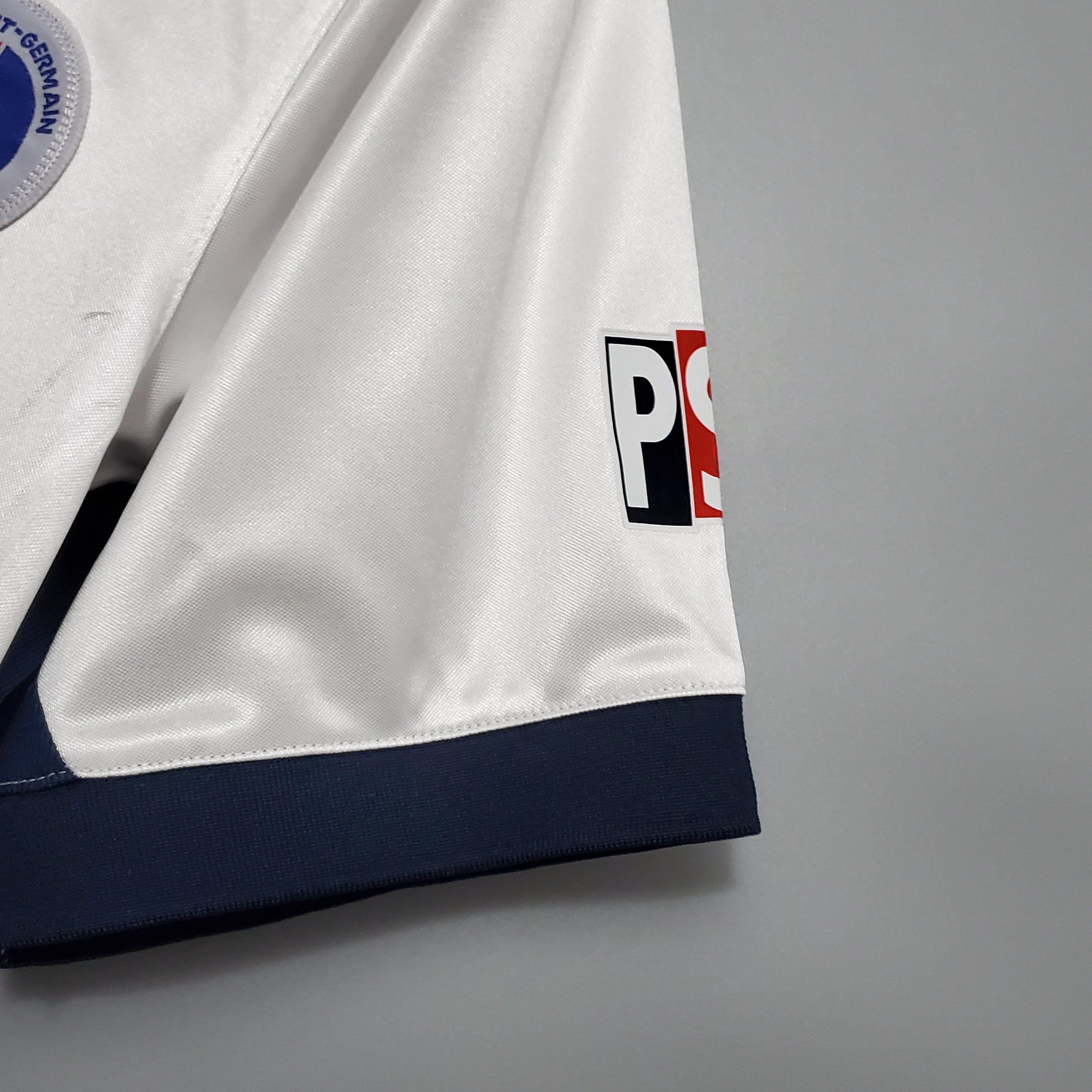 Manga de camiseta de fútbol PSG blanca y azul, diseño exclusivo Reino del Futbol