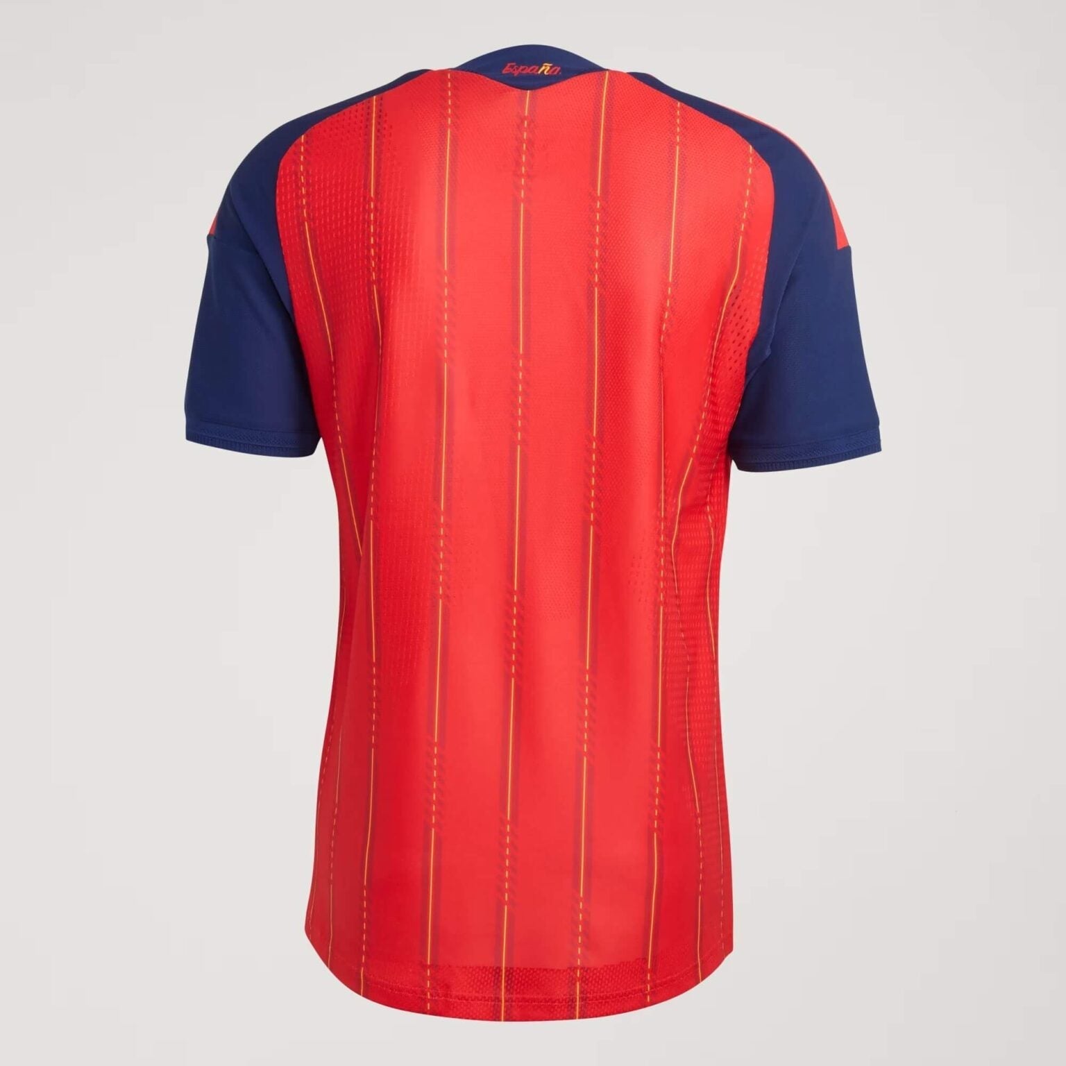 Back view of red and blue Spain football jersey with vertical yellow stripes, Reino del Futbol