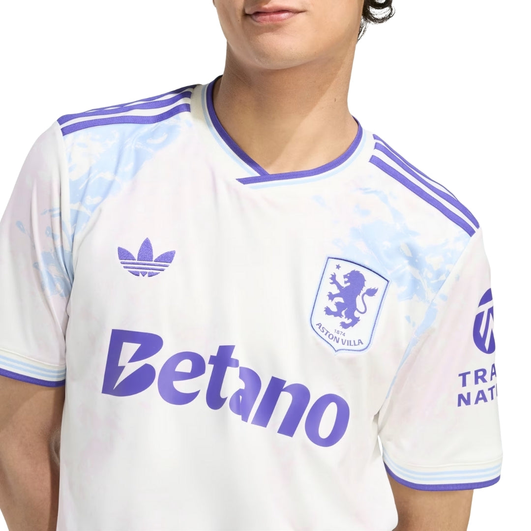 Camiseta Aston Villa tercera equipación 2025-2026 blanca con detalles lilas, patrocinadores y escudo