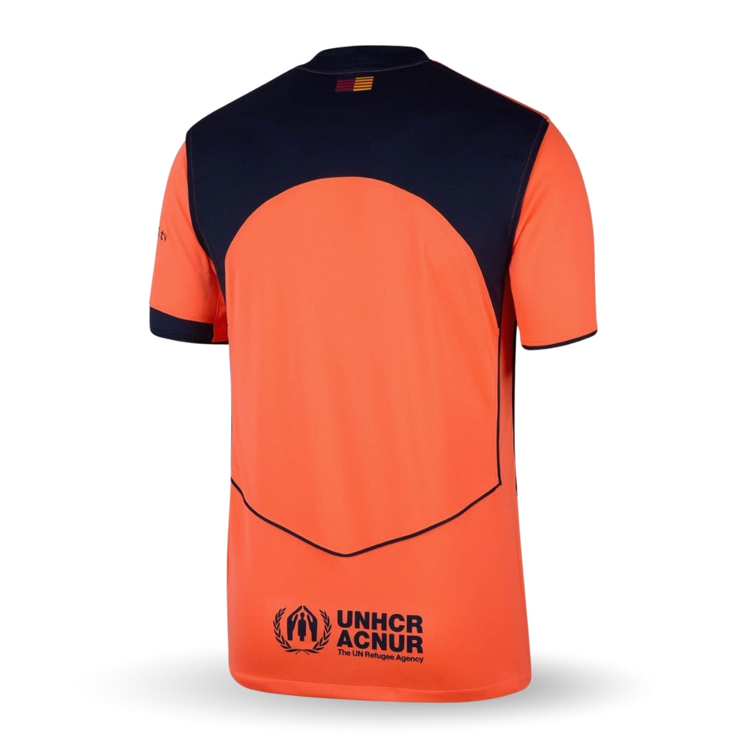 Camiseta fútbol naranja y azul oscuro con logo UNHCR ACNUR, Reino del Futbol