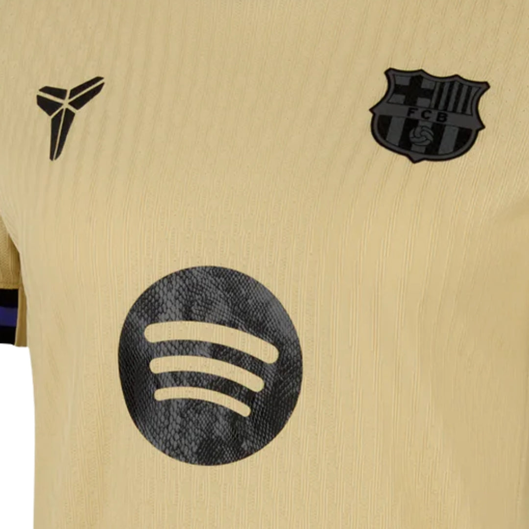 Camiseta Barcelona visitante 25/26 dorada con escudo FCB y logo Spotify, Reino del Futbol
