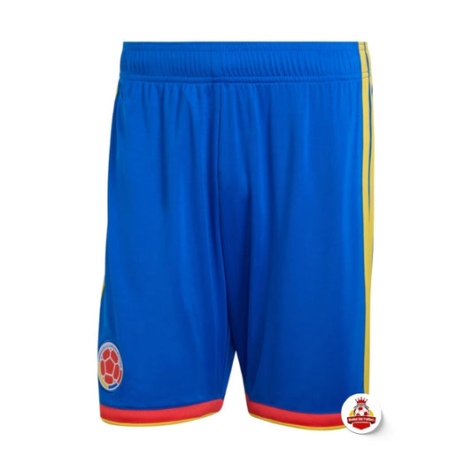 Short azul de fútbol con escudo de Colombia y detalles amarillos, Reino del Futbol