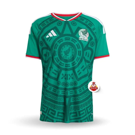 Camiseta verde de la selección de fútbol México con diseño azteca, logo y escudo, Reino del Futbol