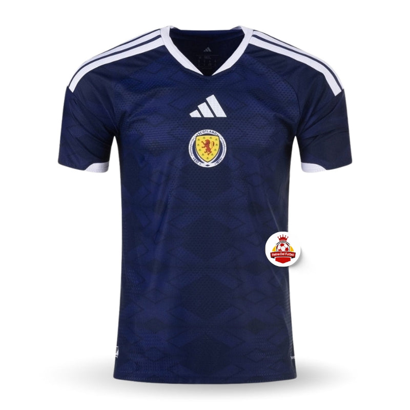 Camiseta de fútbol azul oscuro de Escocia con logo central, estilo Reino del Futbol