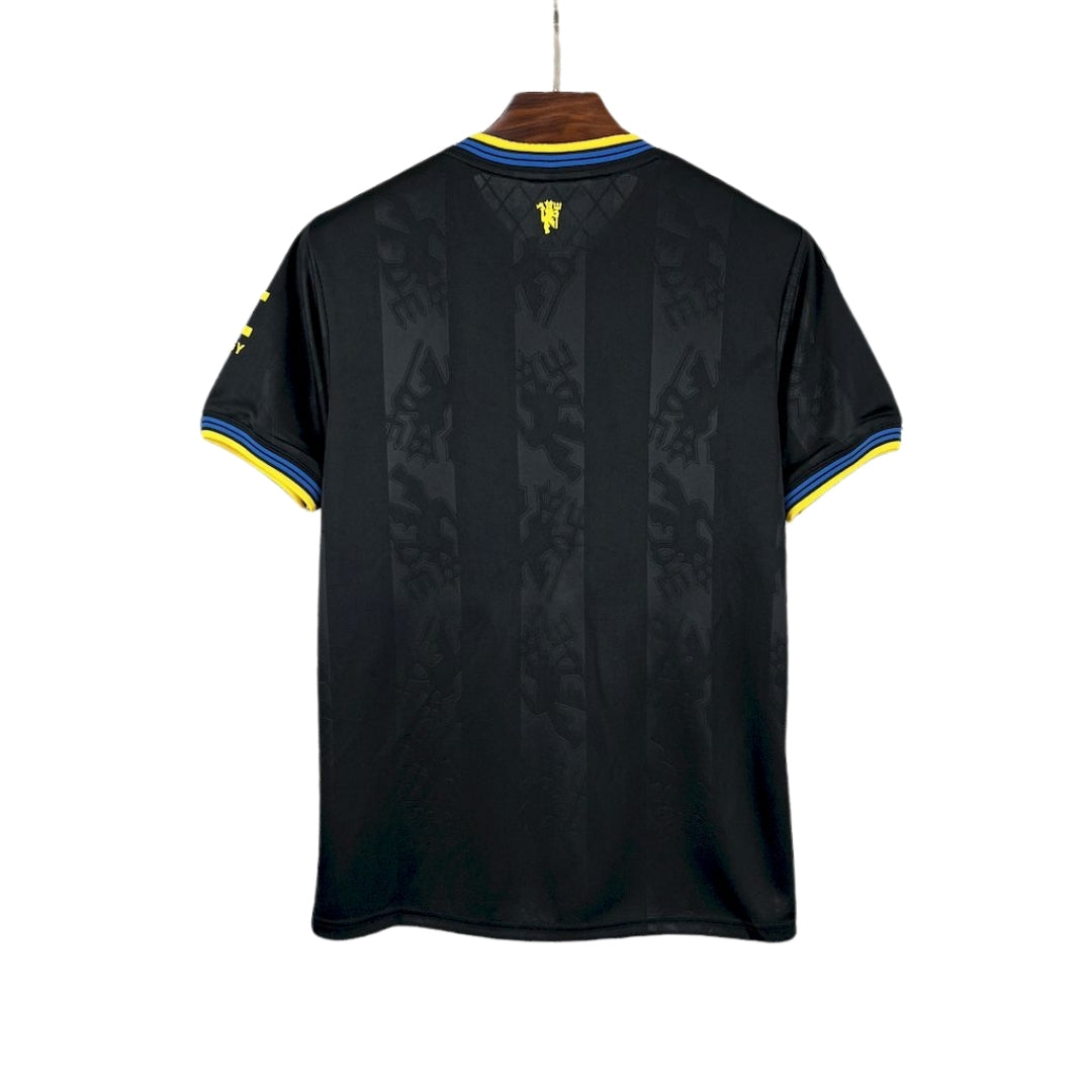 Camiseta Manchester United 2025/26 tercera equipación negra detalles azul y amarillo
