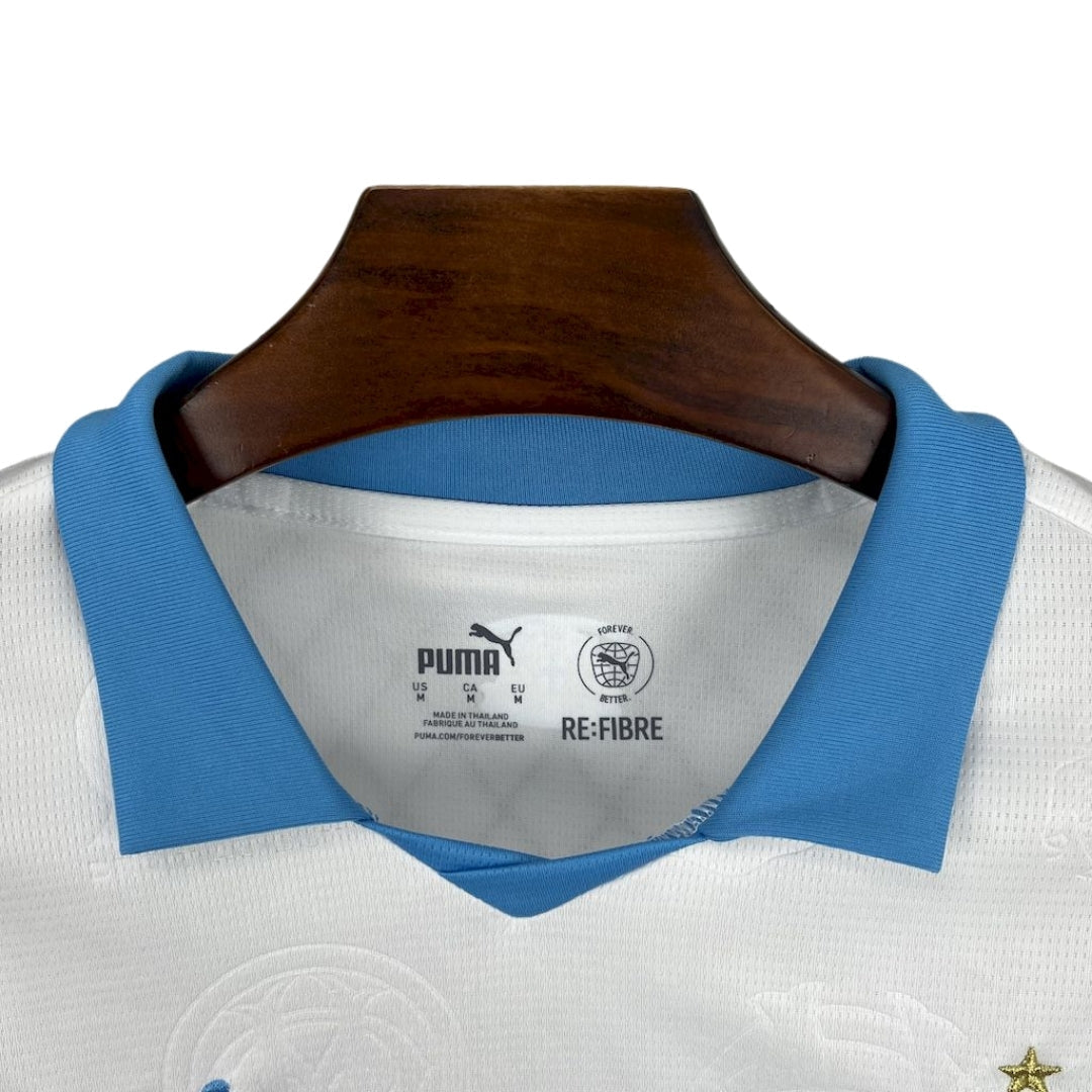 Camiseta Olympique de Marsella 2025/26 local, cuello azul claro, marca Puma en Reino del Futbol