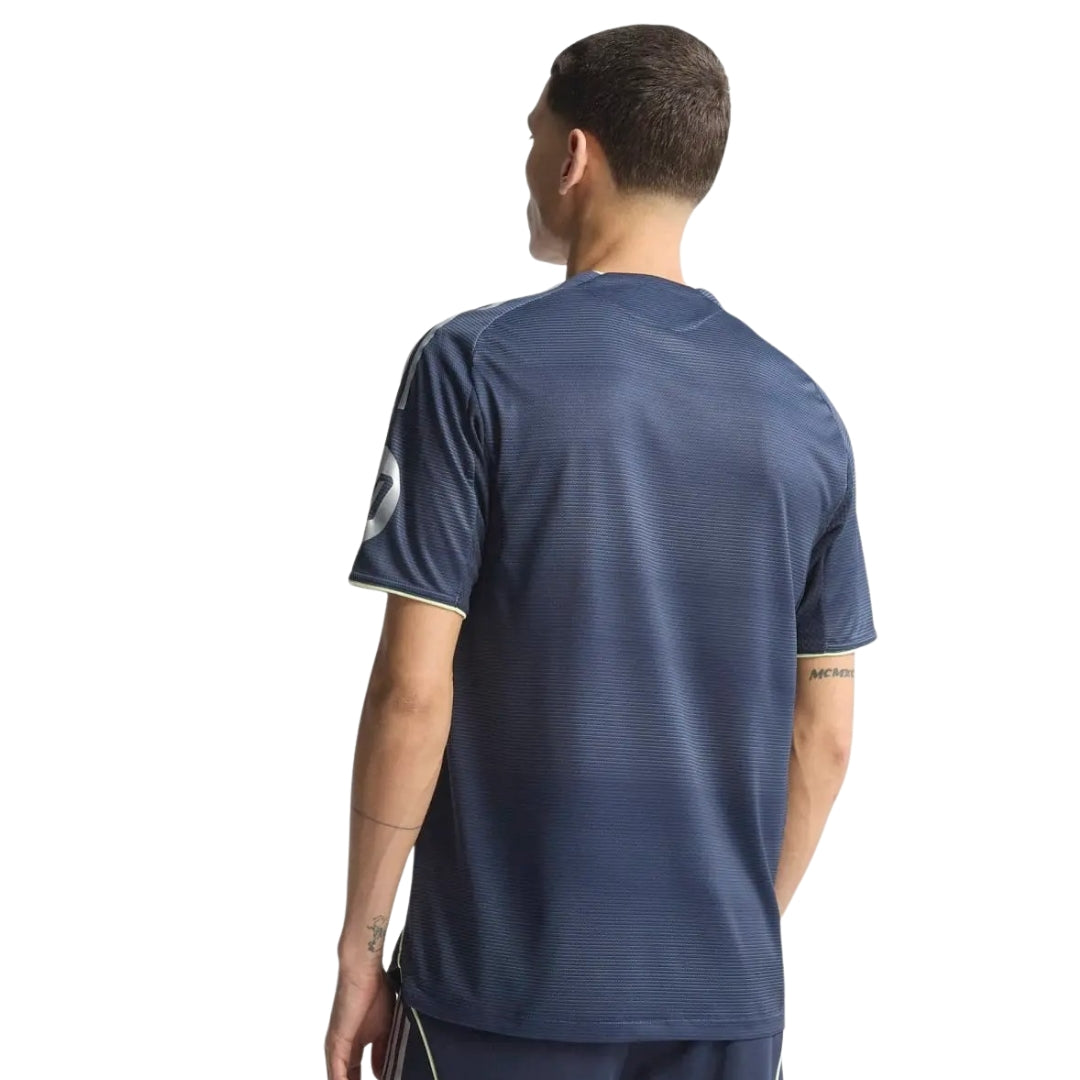 Camiseta azul visitante Real Madrid 2025-2026 versión jugador vista trasera