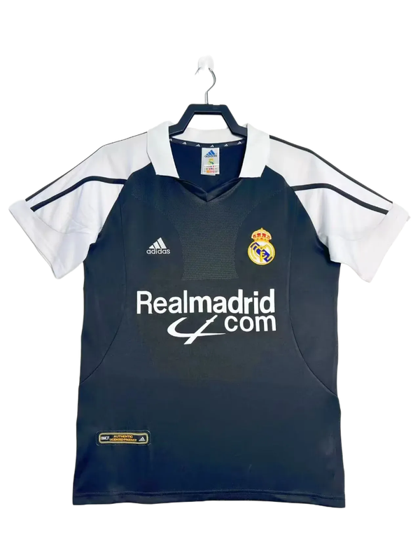 Camiseta retro Real Madrid 2001-2002 visitante negra y blanca, logo Adidas y escudo club