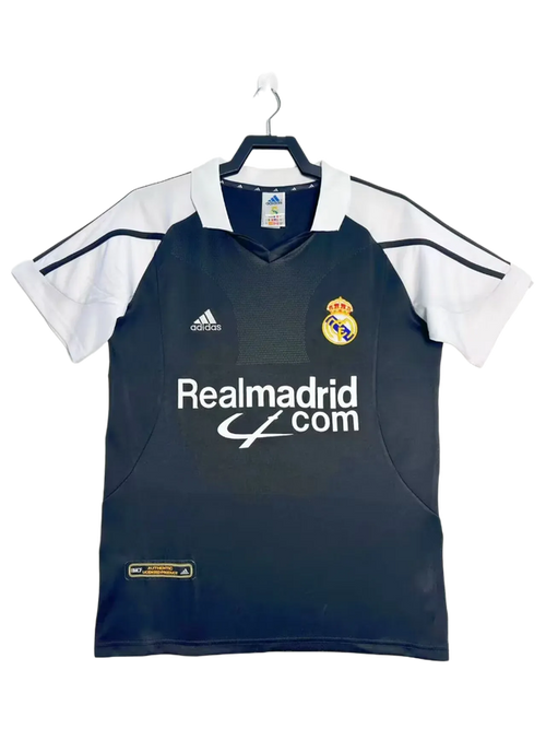 Camiseta retro Real Madrid 2001-2002 visitante negra y blanca, logo Adidas y escudo club
