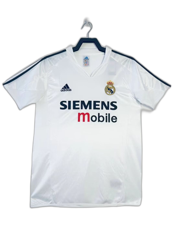 Camiseta retro Real Madrid 2004-2005 local blanca, logo Adidas y Siemens Mobile, disponible en Reino del Futbol.