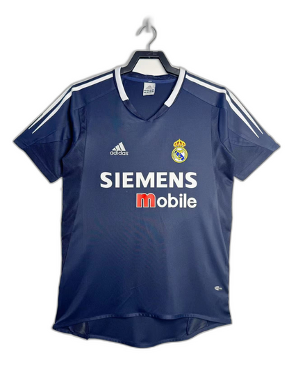 Camiseta retro Real Madrid 2004-05 visitante azul marino con logo Adidas y Siemens Mobile