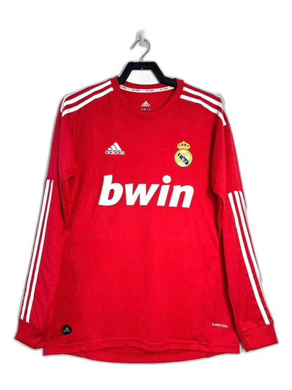Camiseta Real Madrid 2011-2012 visitante roja manga larga, logo Adidas y Bwin, tienda Reino del Futbol