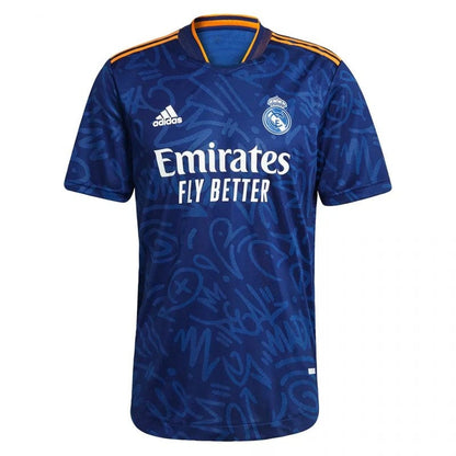 Camiseta Real Madrid 21/22 azul versión jugador, detalles dorados y logotipo Adidas.