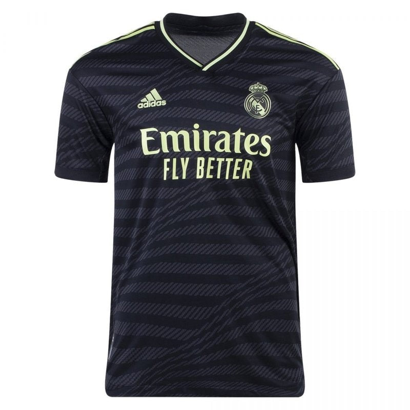 Camiseta Real Madrid 22/23 tercera equipación versión jugador, negra con detalles verdes, disponible en Reino del Futbol.