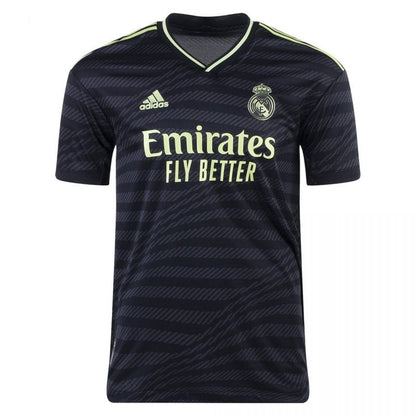 Camiseta Real Madrid 22/23 tercera equipación versión jugador, negra con detalles verdes, disponible en Reino del Futbol.