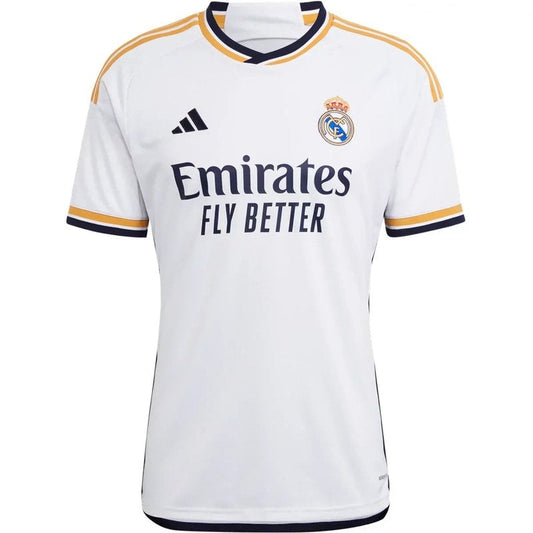 Camiseta Real Madrid 2023-24 local para aficionado, blanca, detalles dorados y logos oficiales