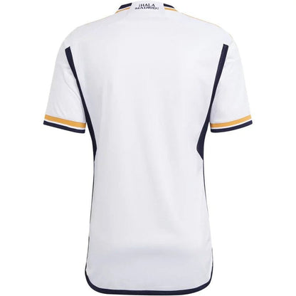 Camiseta Real Madrid 23/24 local, blanca con detalles dorados y azul, vista trasera