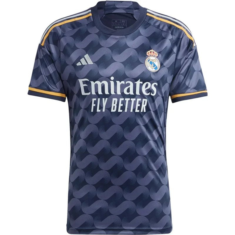 Camiseta Real Madrid 2023/24 azul marino, edición afición, con logotipos y detalles dorados.