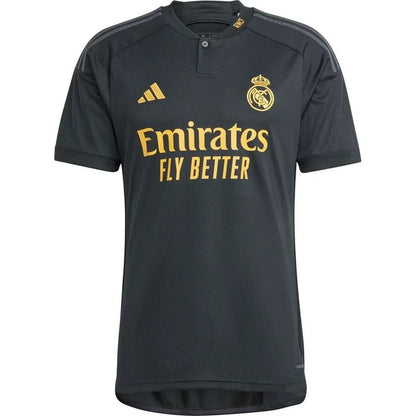 Camiseta Real Madrid 2023/24 tercera equipación negra con detalles dorados, versión aficionado.