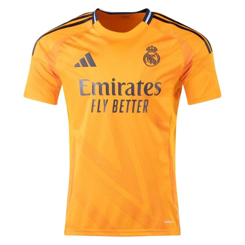 Camiseta Real Madrid 24/25 segunda equipación naranja, logo adidas y patrocinador Emirates, Reino del Fútbol