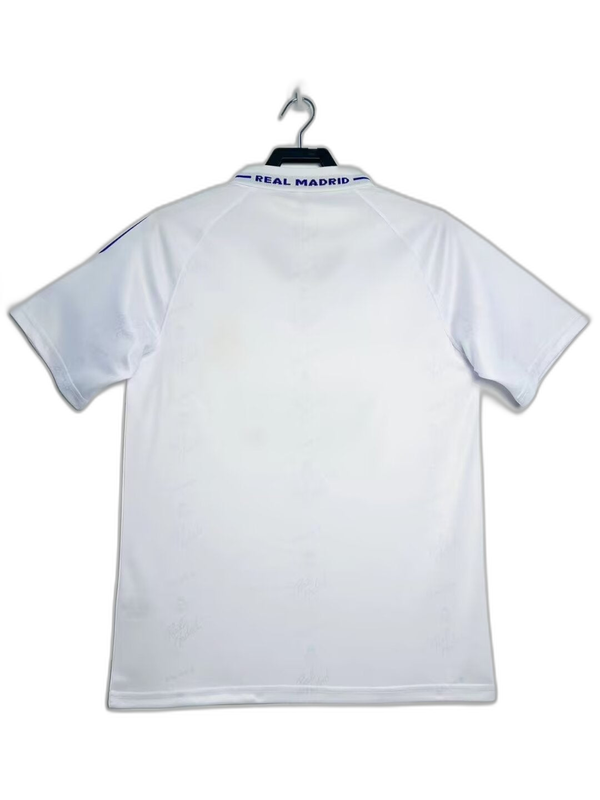Camiseta retro Real Madrid 94-96 blanca, vista trasera, detalles clásicos en el cuello