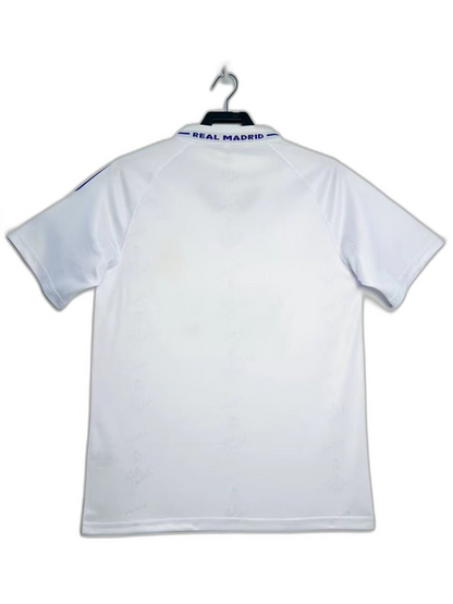 Camiseta retro Real Madrid 94-96 blanca, vista trasera, detalles clásicos en el cuello