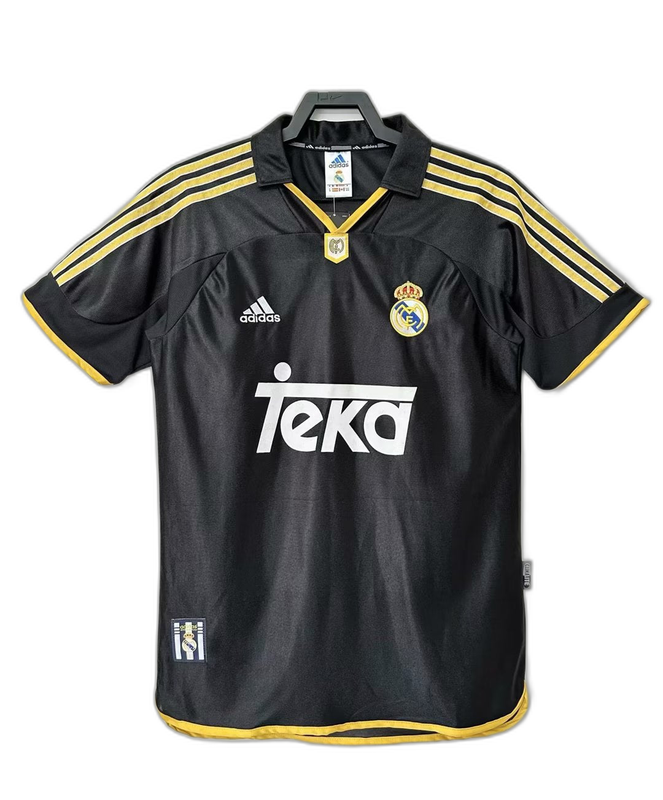 Camiseta Real Madrid 1999-2001 negra retro, con detalles amarillos y logo Teka