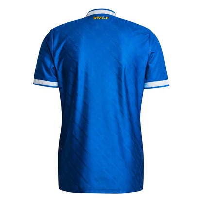 Camiseta de fútbol azul con texto RMCF en amarillo, disponible en Reino del Futbol España.